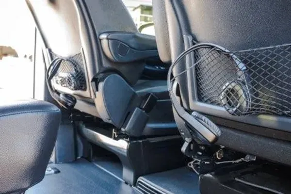 DLT's Mercedes Benz black backseat view