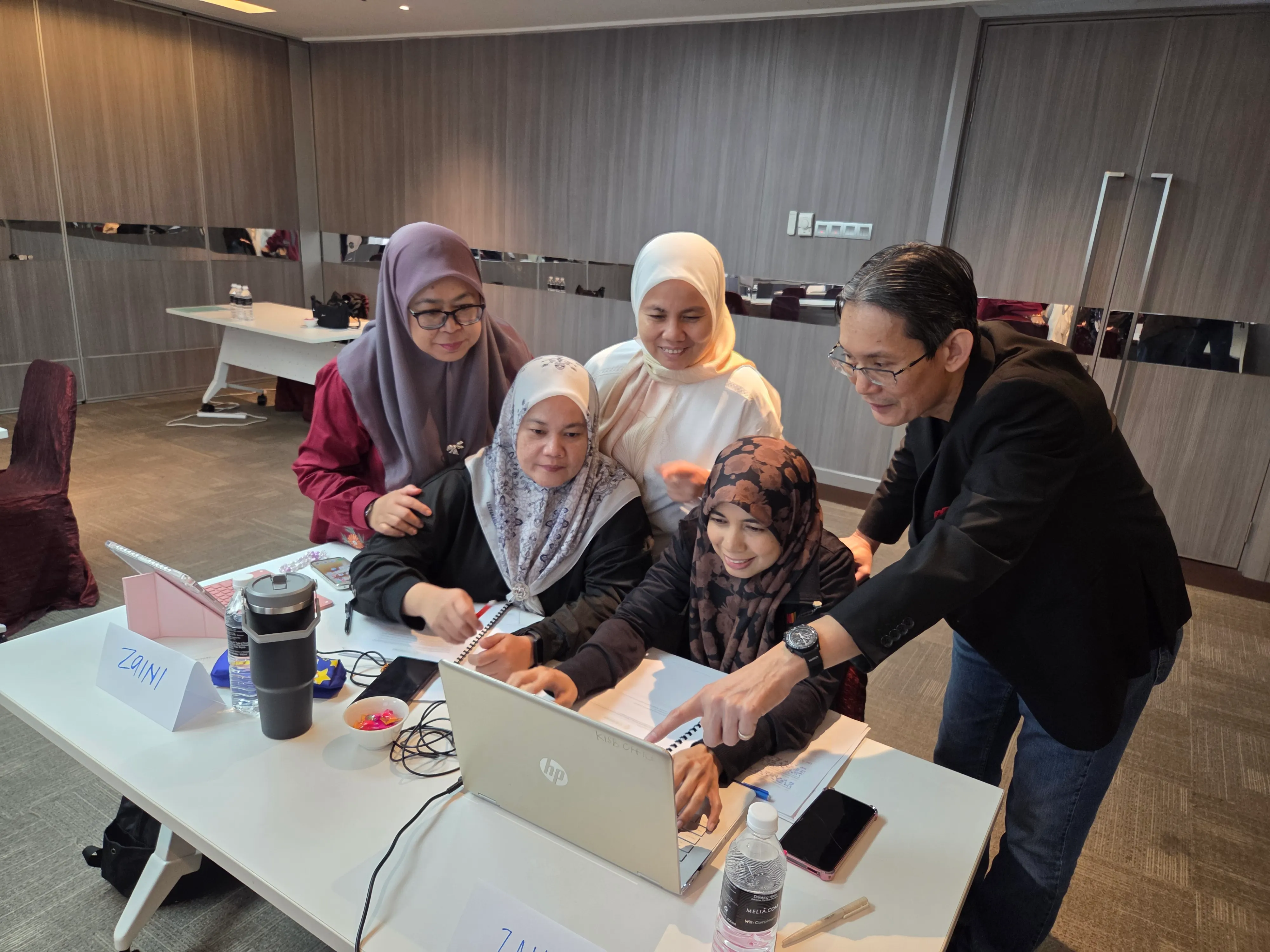 2NRich Asia AI-Powered Solutions training session in Malaysia — participants engaged in experiential learning and team activities