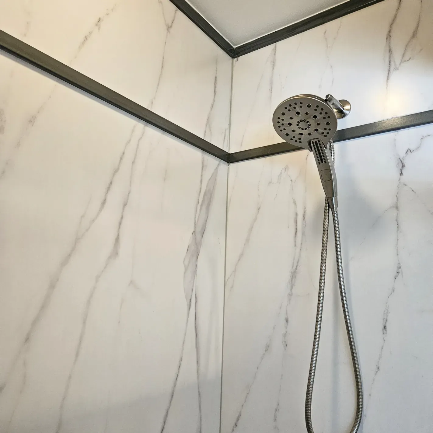 white marble shower tile 