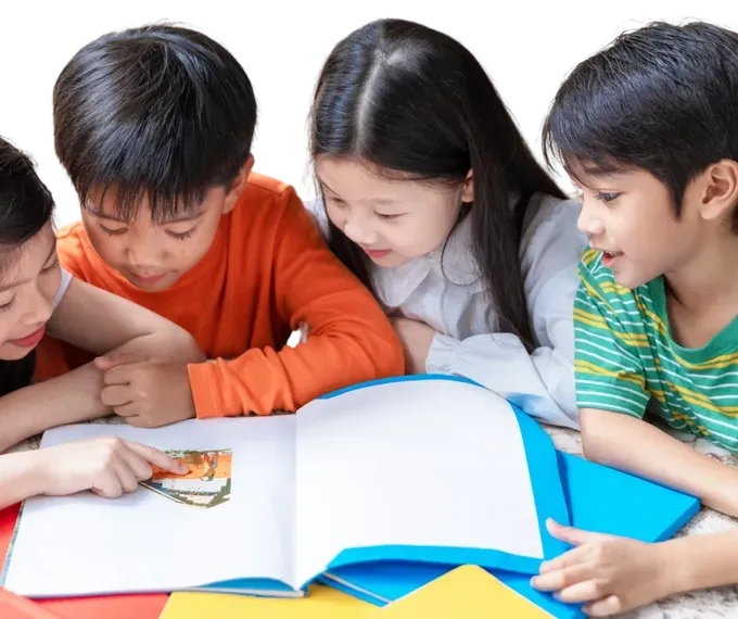 children reading a book