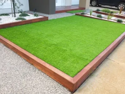 Small front yard with artificial grass