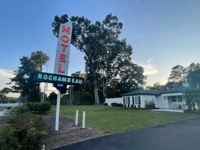 retro motel Rochambeau sign at sunset