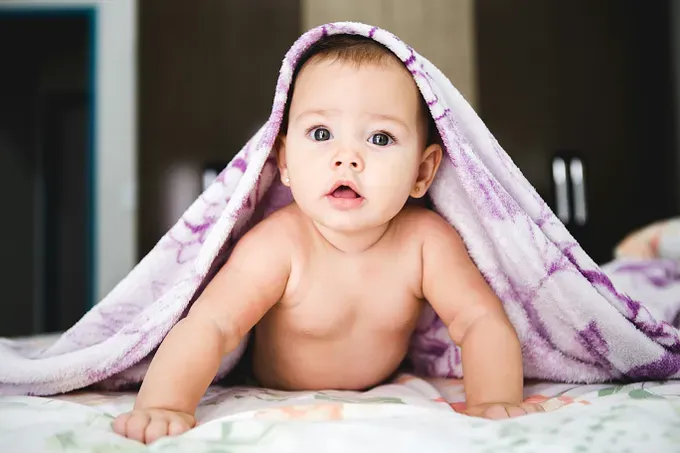 Close-up of a baby just waking up from a nap