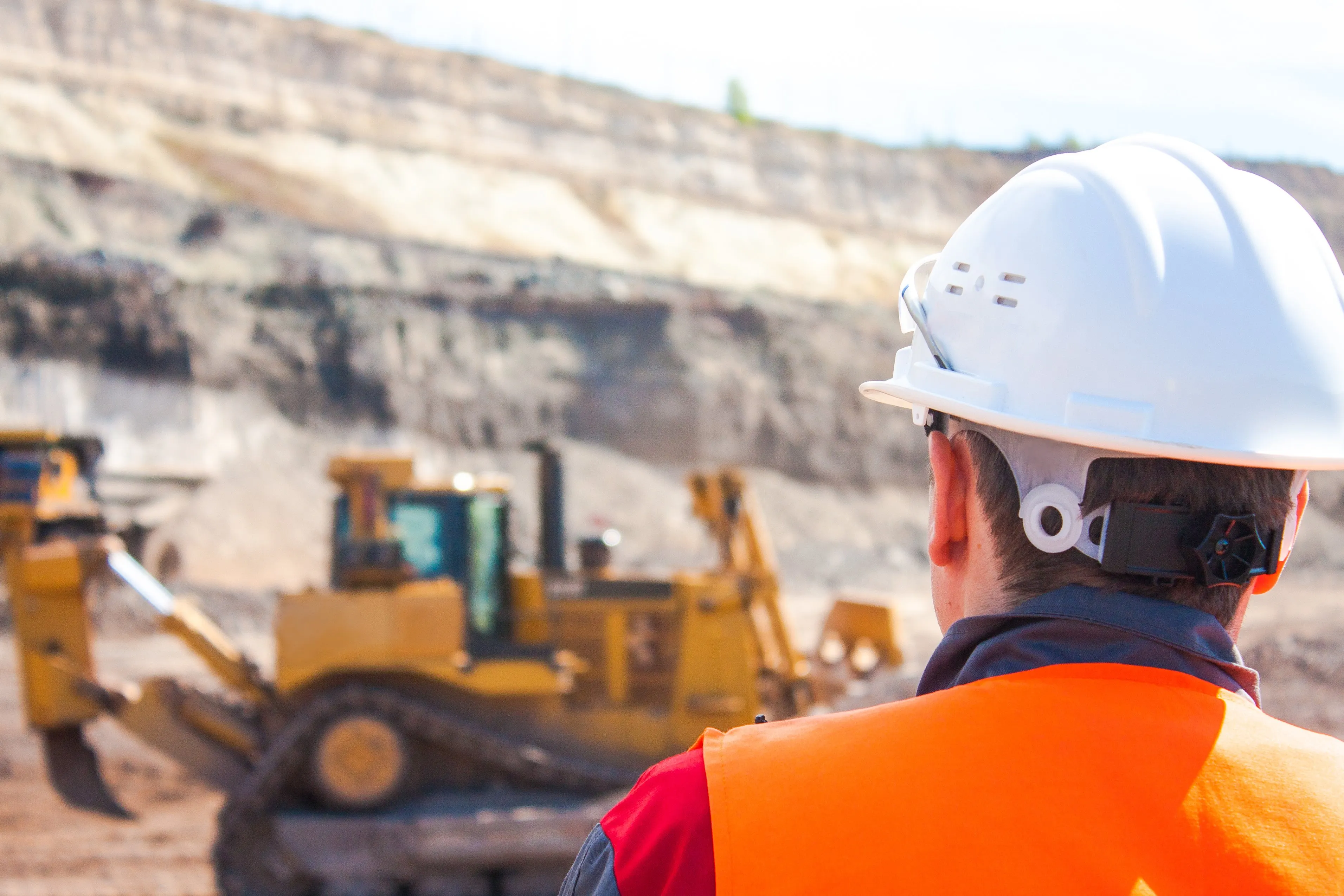 Man overseeing mining operation