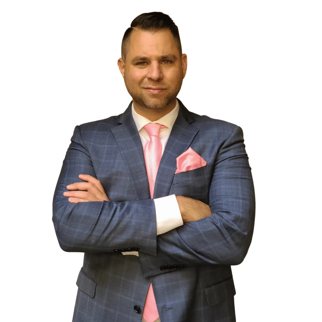 Confident speaker in a suit addressing an audience, illustrating the goal of commanding the stage with ease.