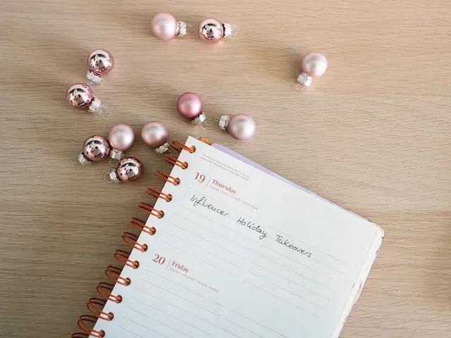 use a journal and calendar to organize your content when promoting on social media without ads