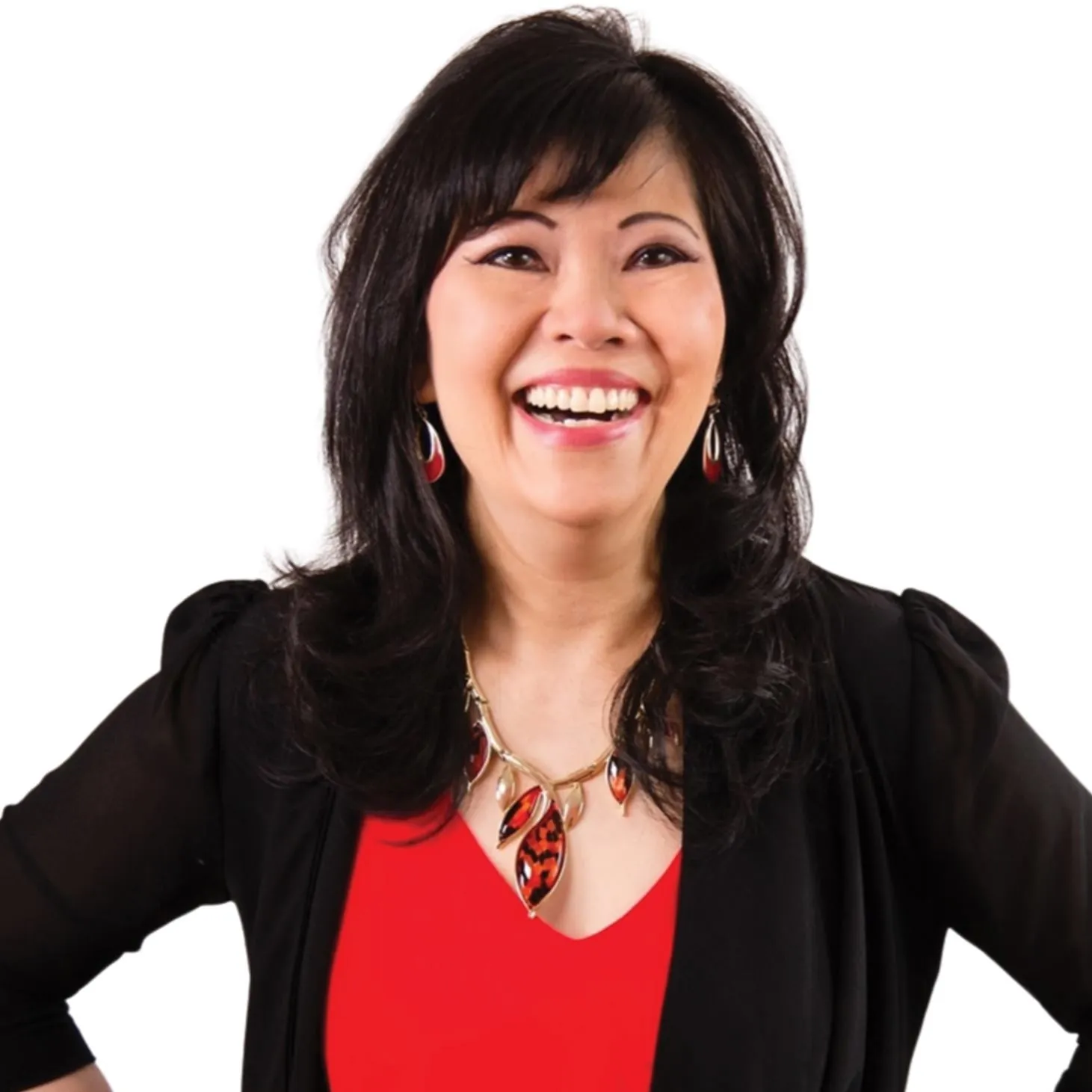 picture of author, speaker, emotional wellness coach - Agnes Goh Hobmaier dressed in red blouse and black blazar, smiling gorgeously, red necklace and red earring 