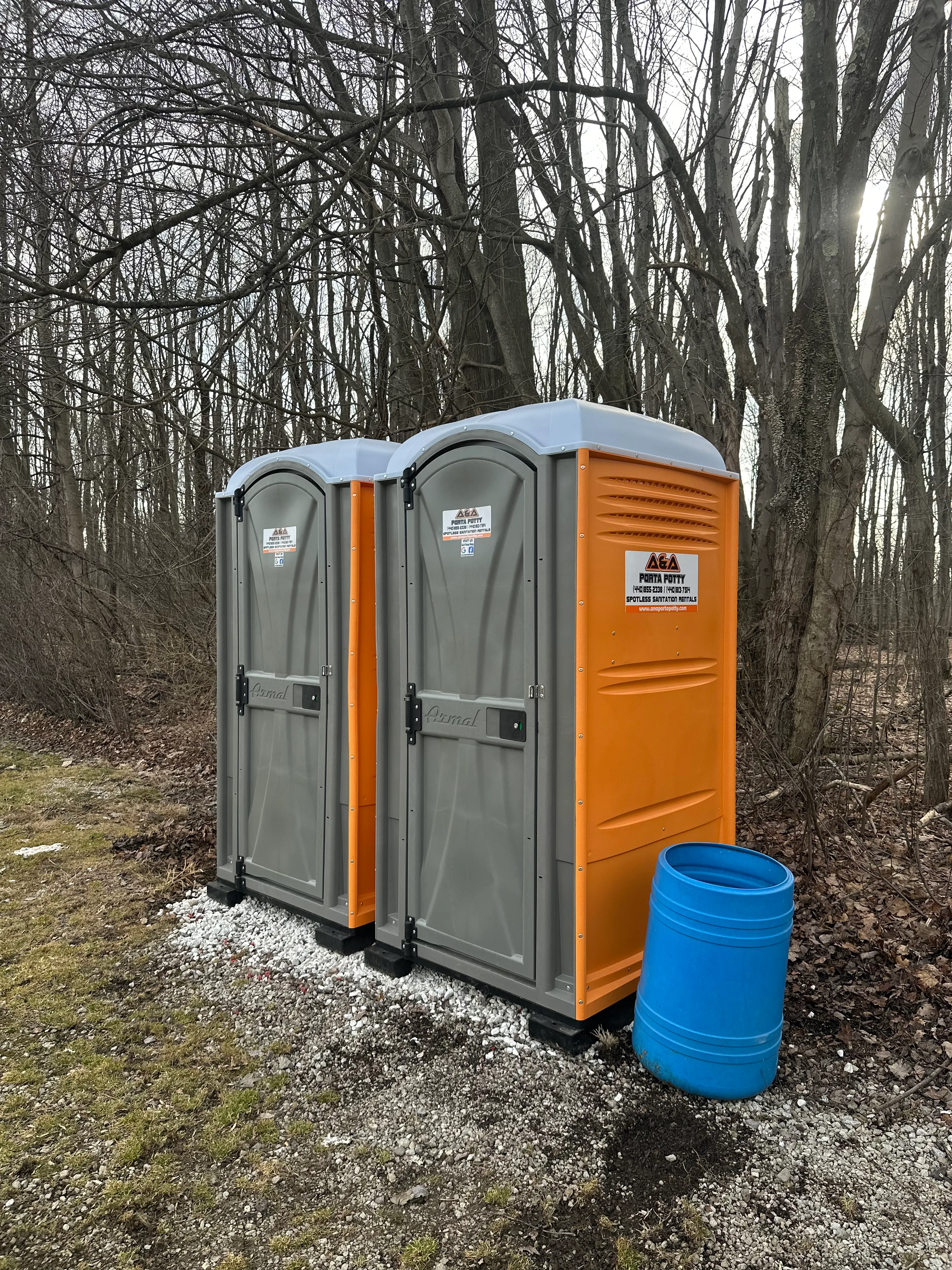 Orange and gray porta-potty