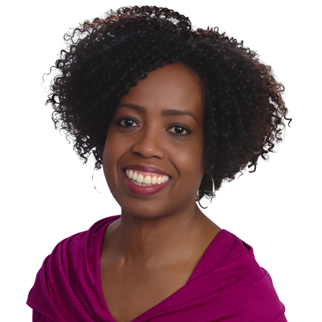 Professional headshot of Coach Judy Handwerker, Certified Wellness Coach, smiling warmly against a transparent background. She has natural curly hair, hoop earrings, and is wearing a vibrant magenta top. The portrait conveys confidence, approachability, and encouragement, reflecting her passion for helping individuals improve their health, fitness, energy, and overall well-being. The clean background makes the image ideal for websites, speaker profiles, wellness programs, coaching materials, and promotional content.