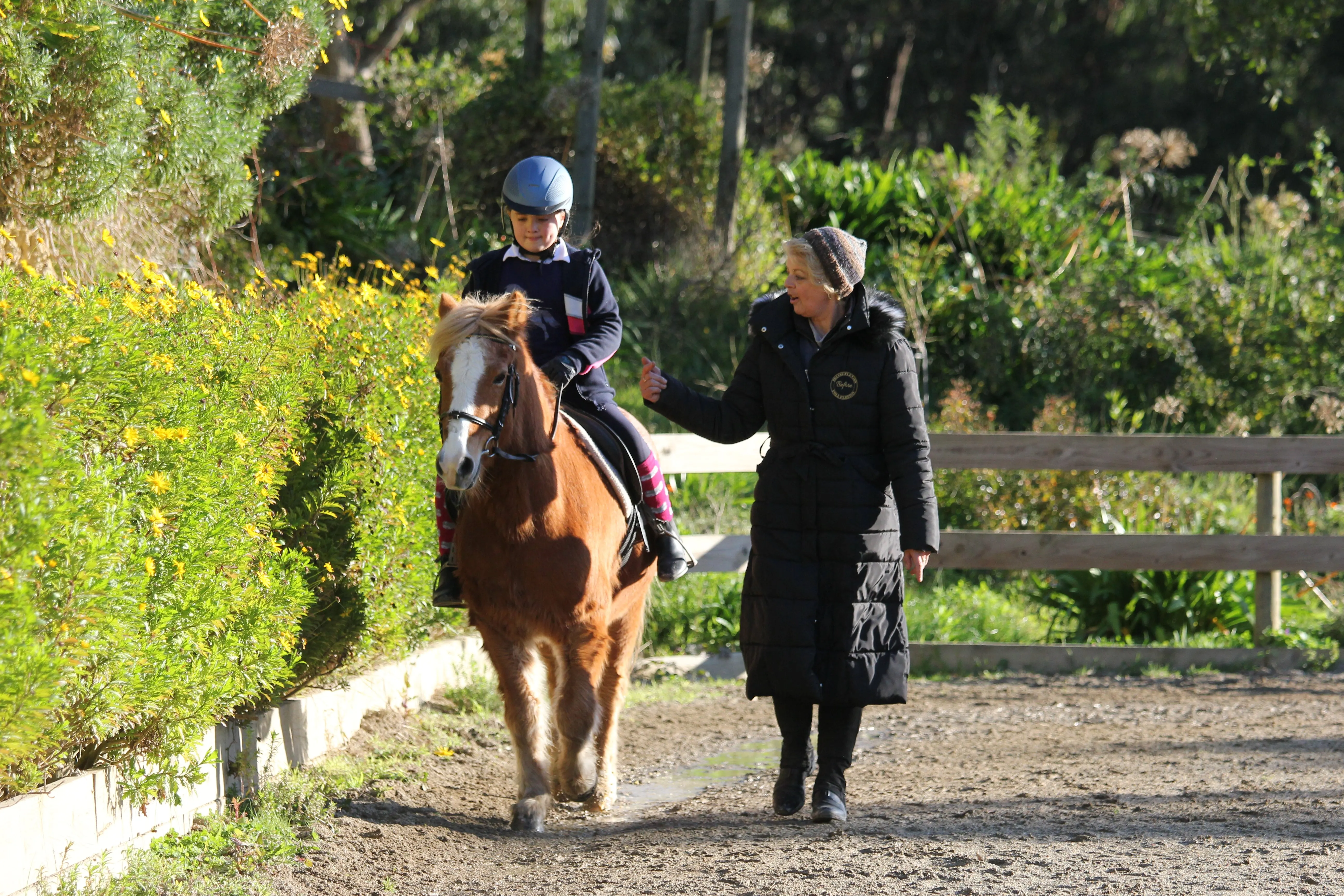 Leanne coaching one of our younger riders on Santa