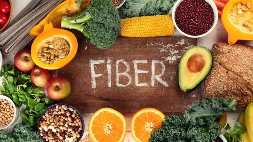 Lots of fiber rich foods on a cutting board in the kitchen.