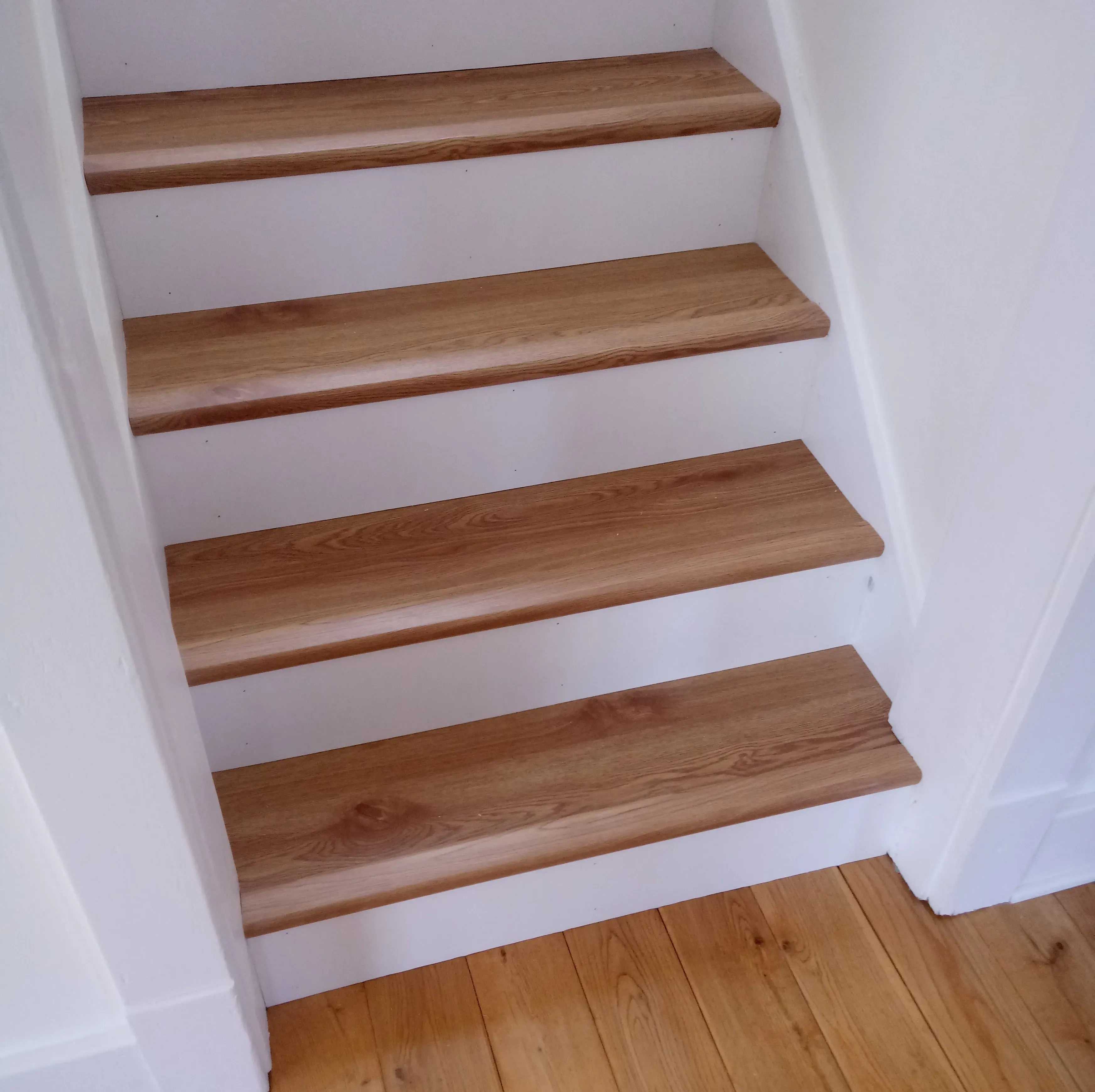 Finished wood staircase reconstruction 