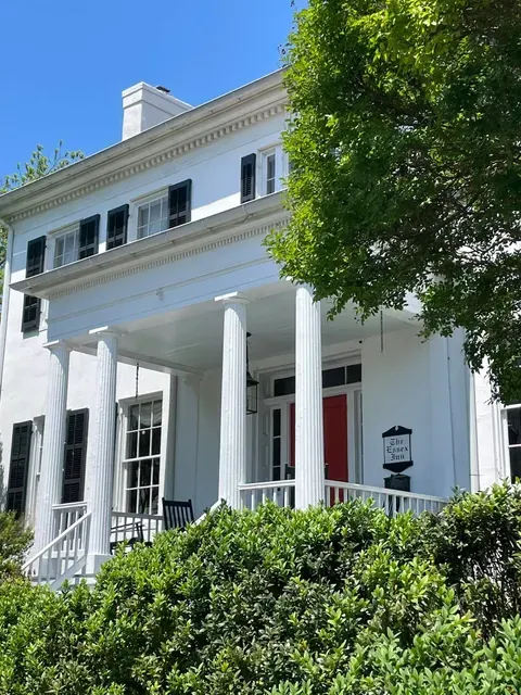 Front porch of the 1850s Greek Revival Mansion now The Essex Inn owned by Greg Huff and open for reservations