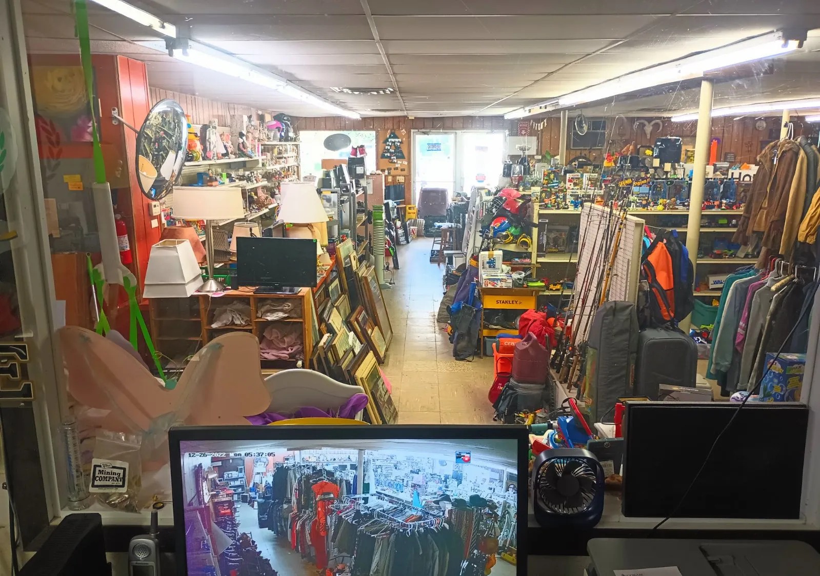 A view of the diverse and well-organized interior of Thrifty Treasures thrift store in East Lansing, Michigan, showcasing a wide range of unique items and collectibles.