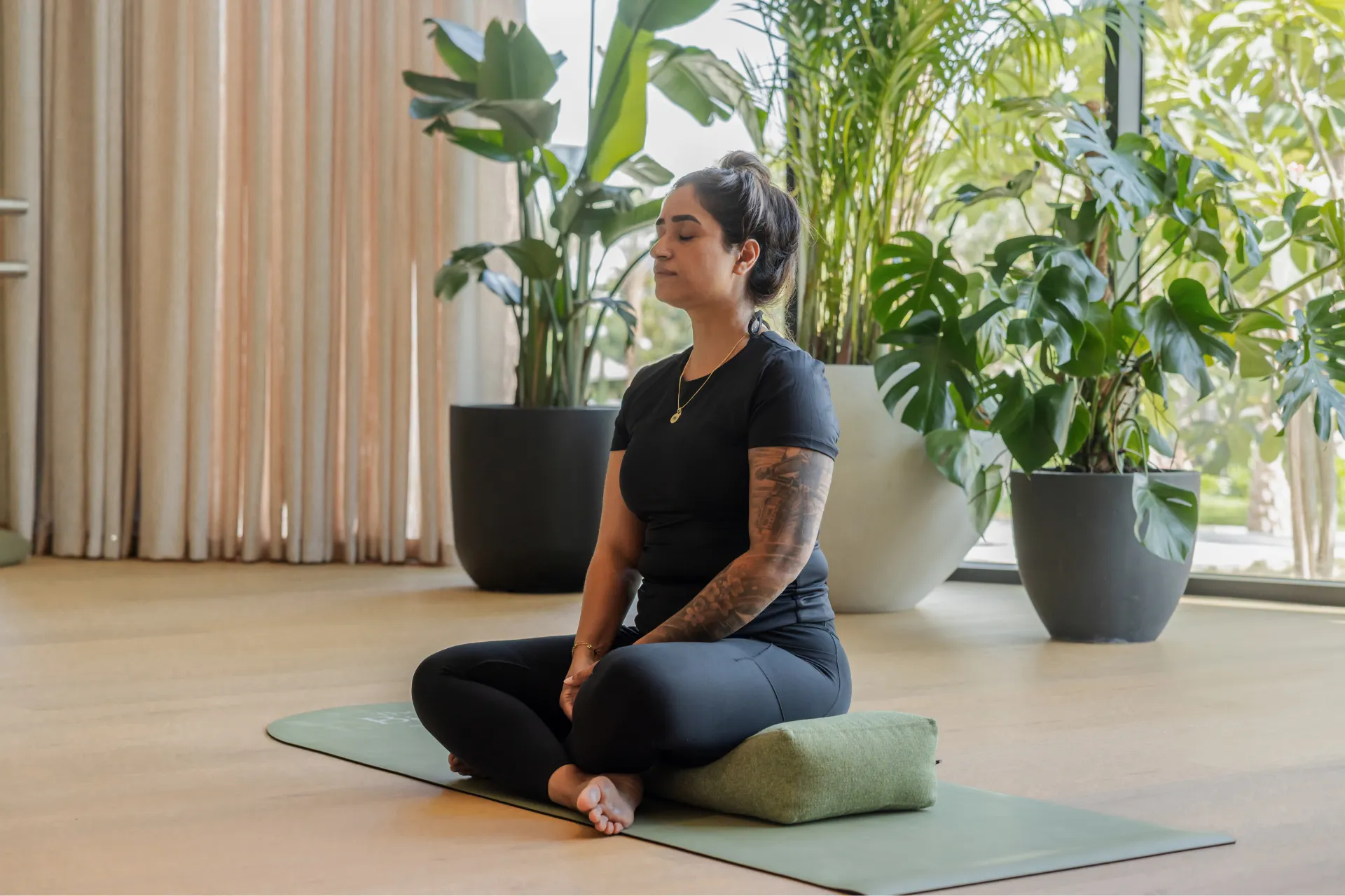 Breathwork and meditation practice in a seated pose for relaxation and mental clarity