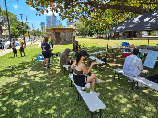 People coming in Thomas Square Aug 26 2023 512x384 c