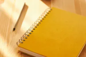 writing in a notebook