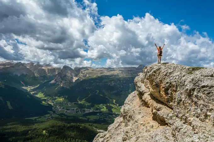 woman on top of the mountain