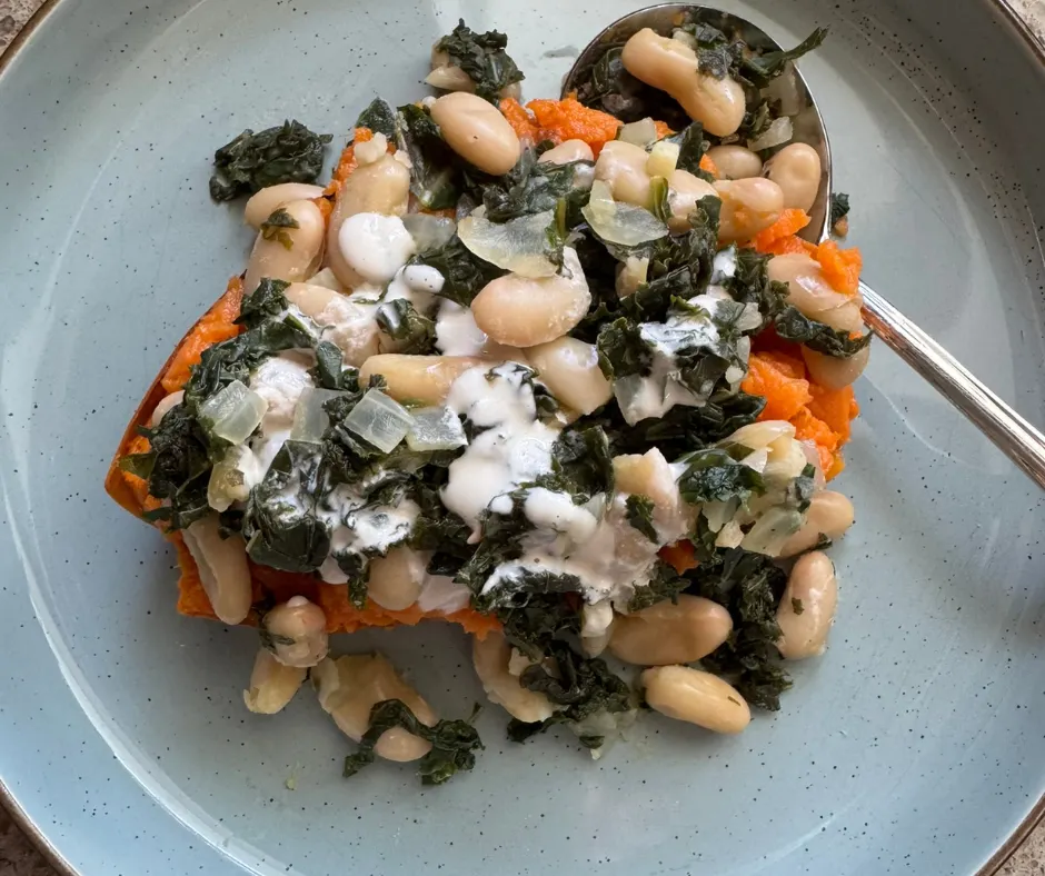 Kale and white bean bowl made with Tower Garden greens and sweet potato
