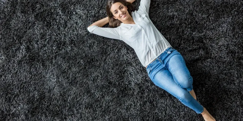 lady lying on her clean fressh carpet