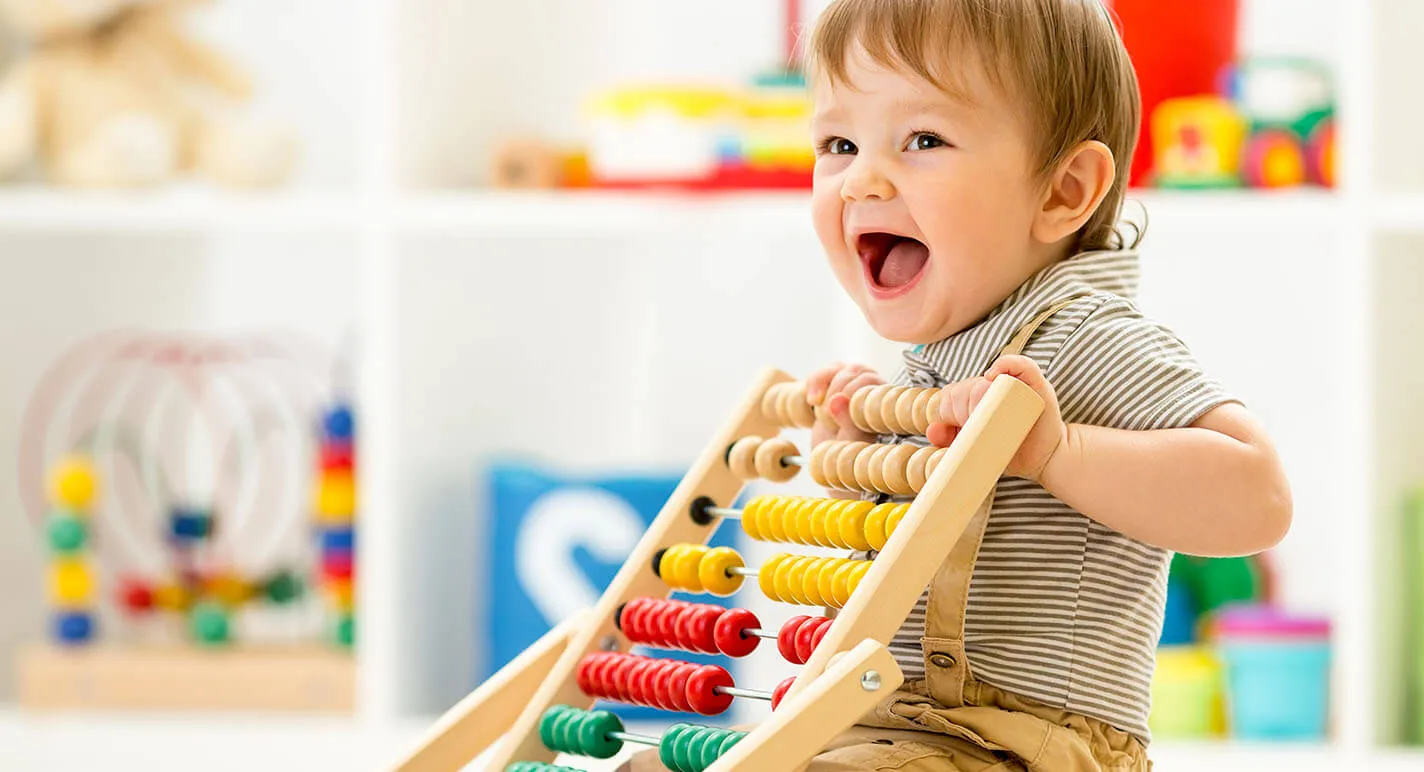 LearningTime with Toddler at school with bead abacus