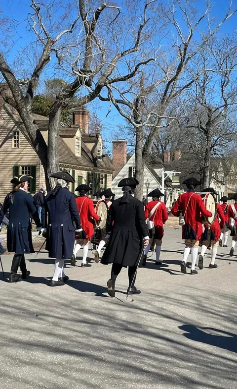 Relationships between Jefferson and Madison who are represented marching together with Washington on President's Day