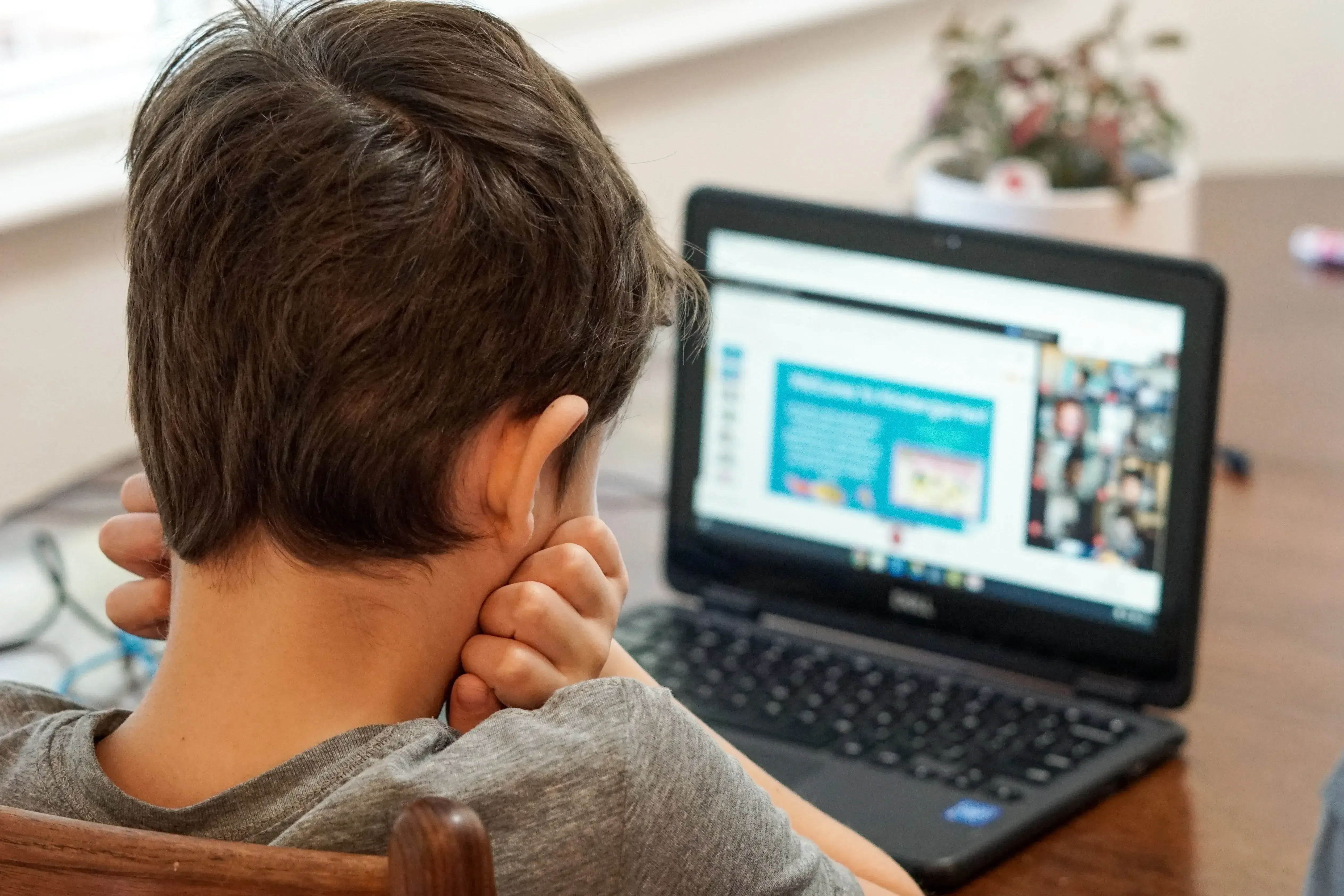 frustrated kid on the computer with adhd