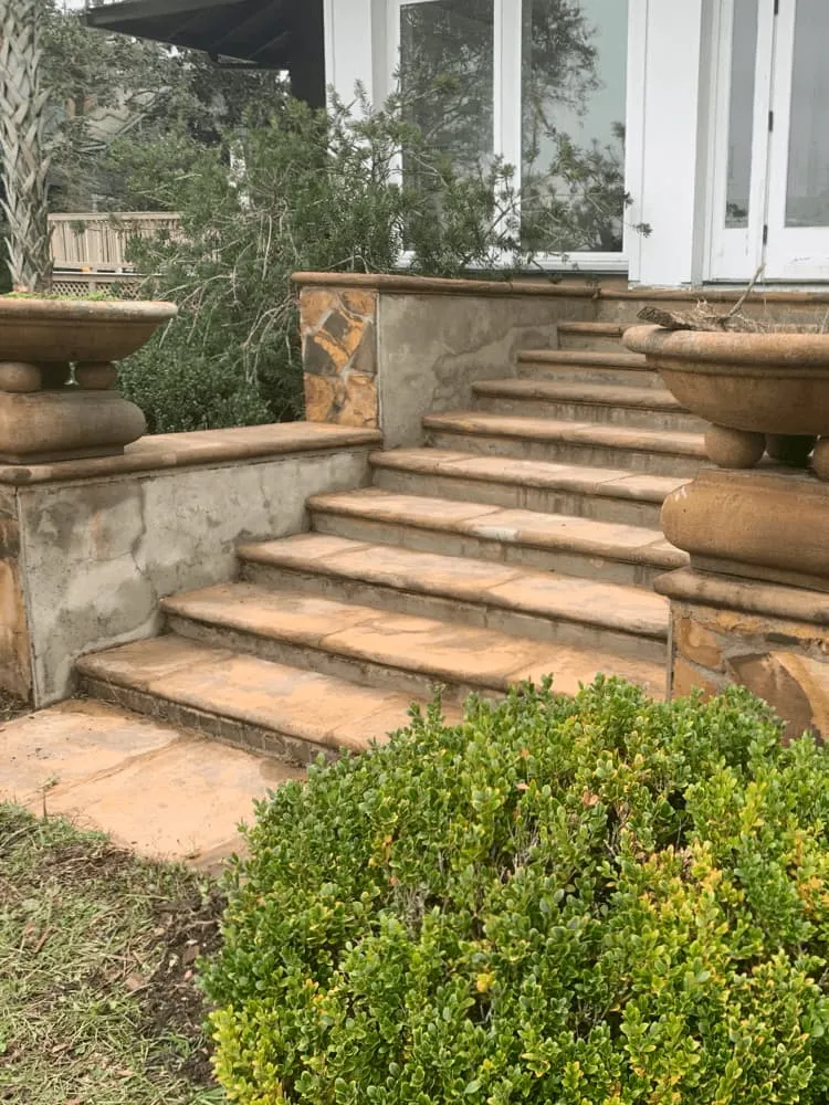 <alt=“After stone stair and entryway cleaning in Theodore, Mobile County, Alabama showing fully restored clean stone steps and refreshed residential entrance.”>
