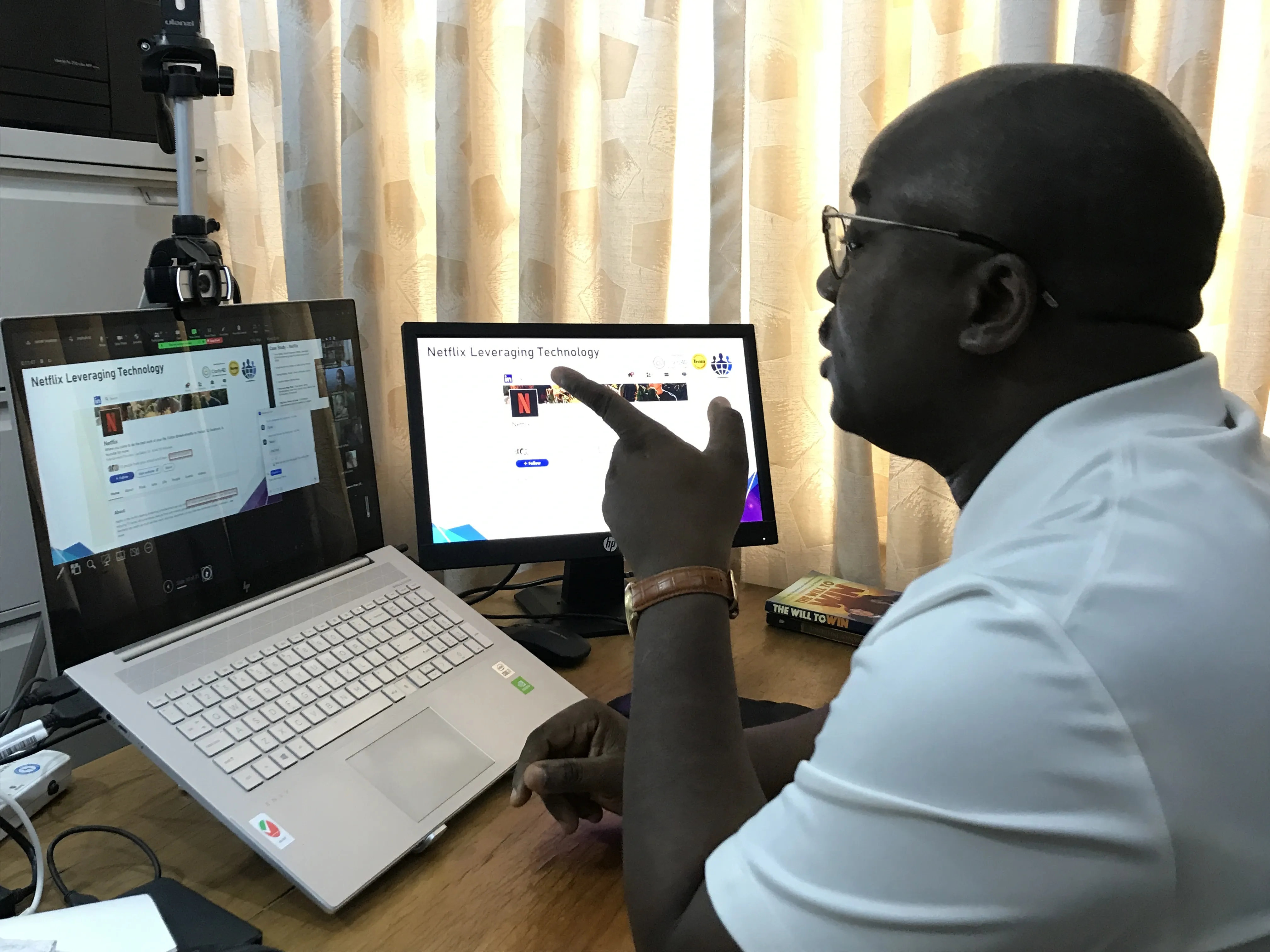 Suleiman Shaibu Teaching Clients Remotely
