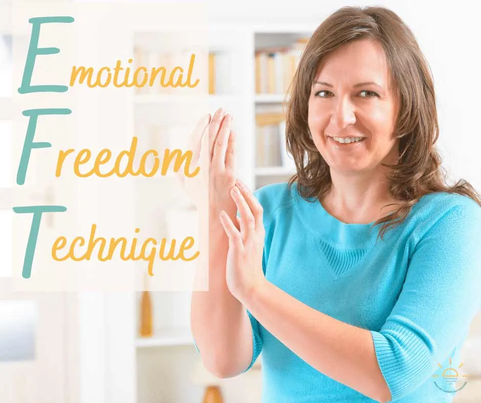 A woman demonstrating EFT