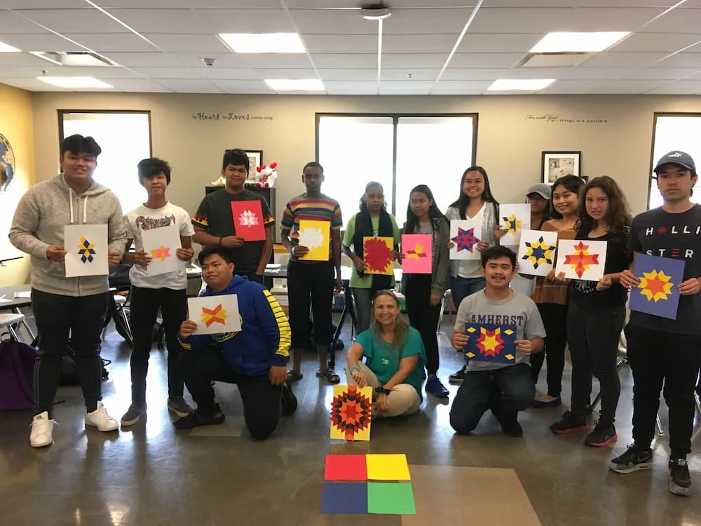 Barbara Derrick teaching Indigenous Culture to School Students