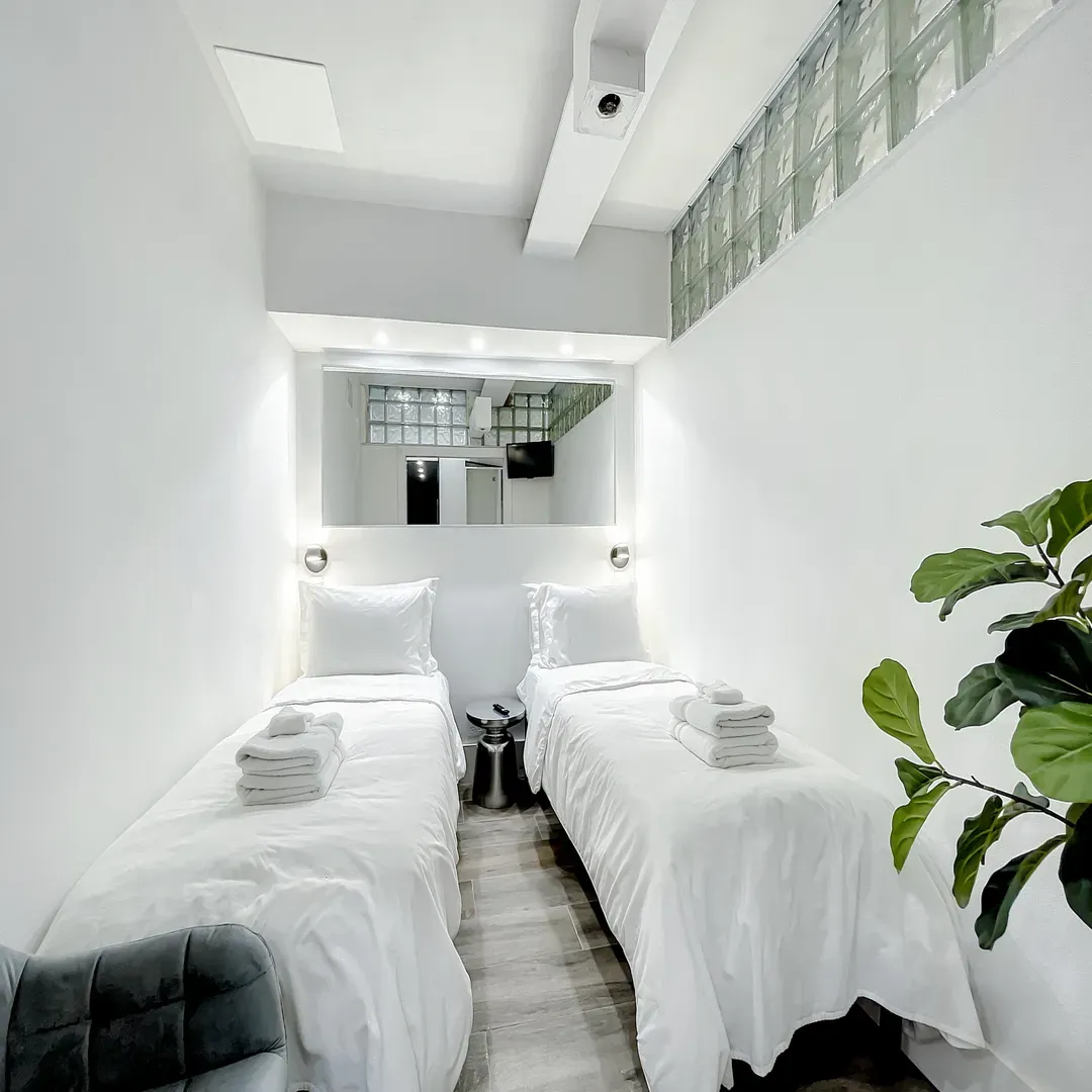 Bedroom Nr 3 with 1 Queen Bed or 2 Single Beds. 24-inch Smart TV.