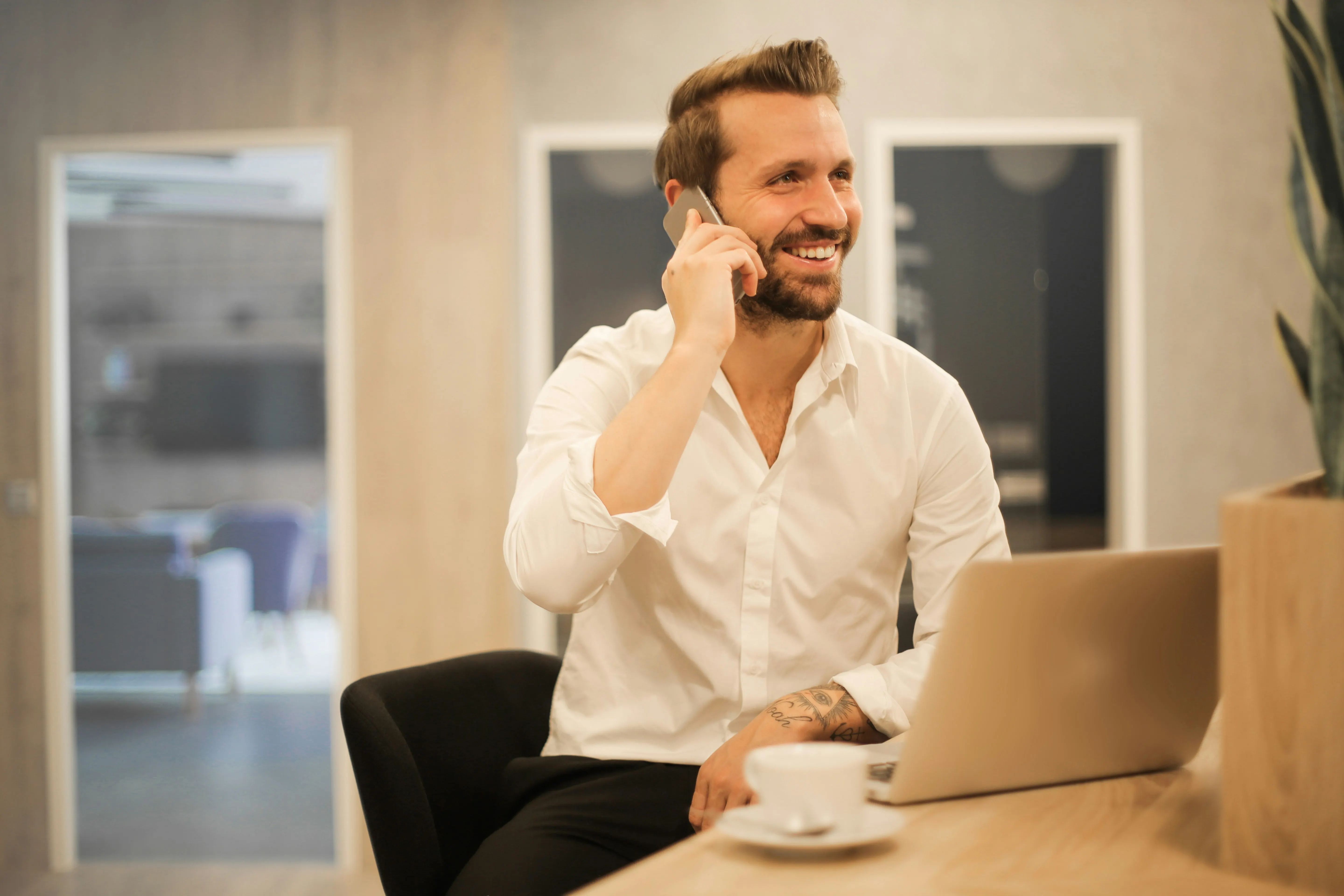 man using headset and computer