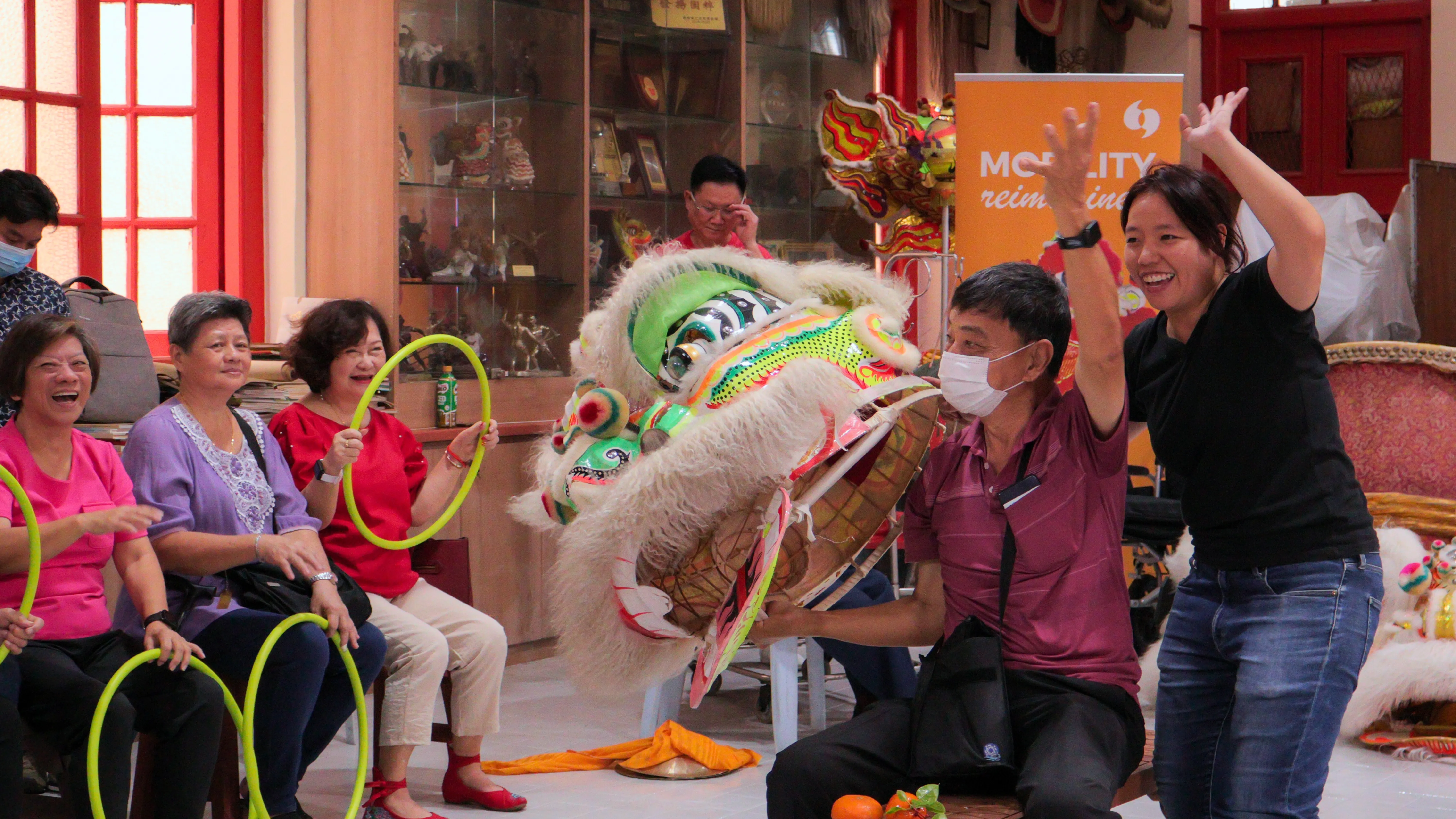 Learning lion dance with elderly at Kong Chow Wui Koon