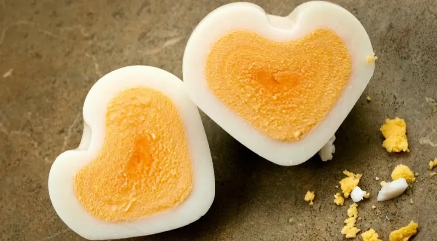 Hard boiled eggs shaped like hearts.