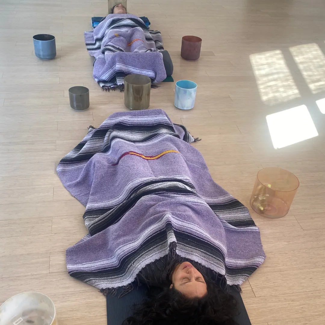 Private Sound Bath with Crystal Bowls Surrounding Participants