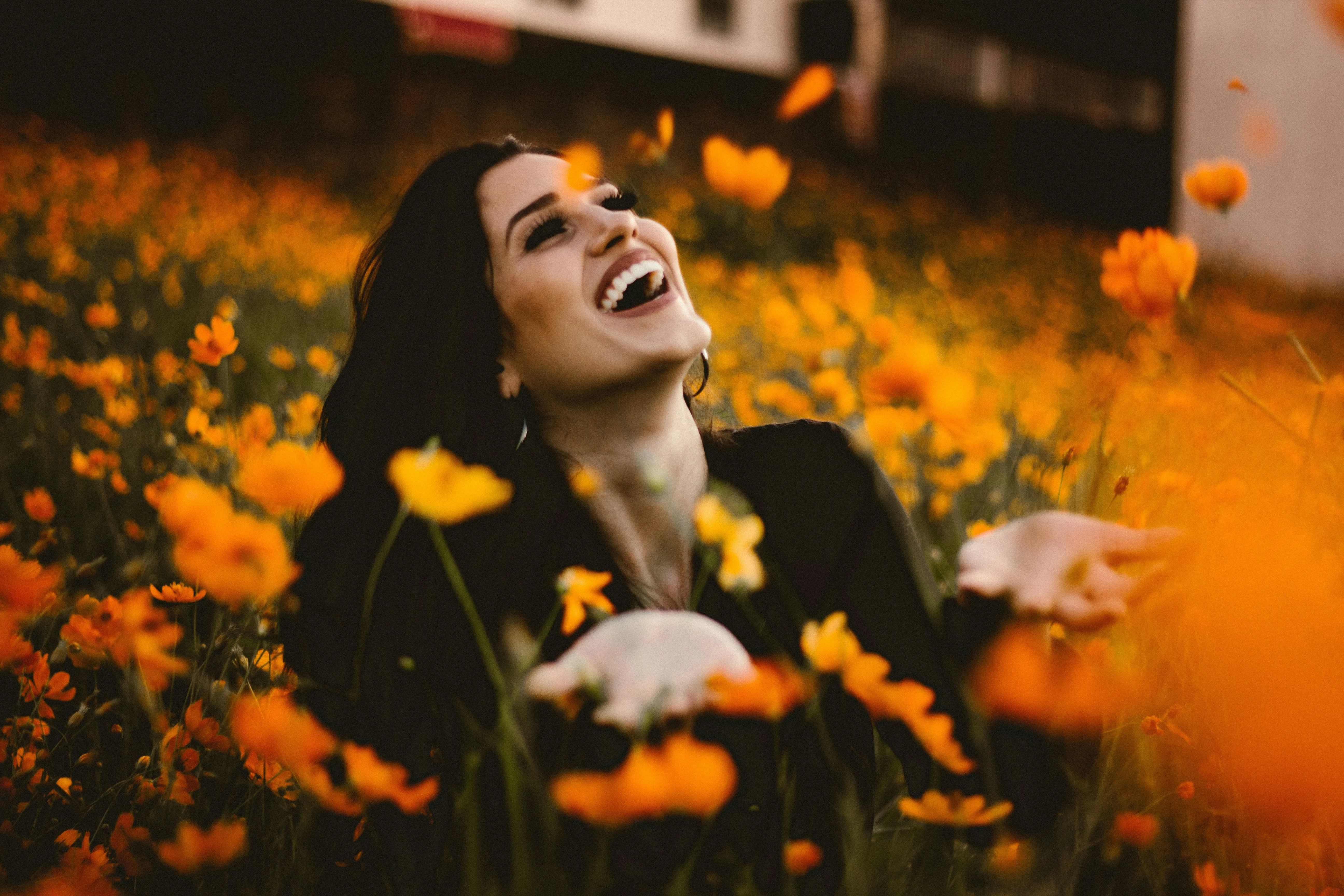 Happy woman in a field of flowers