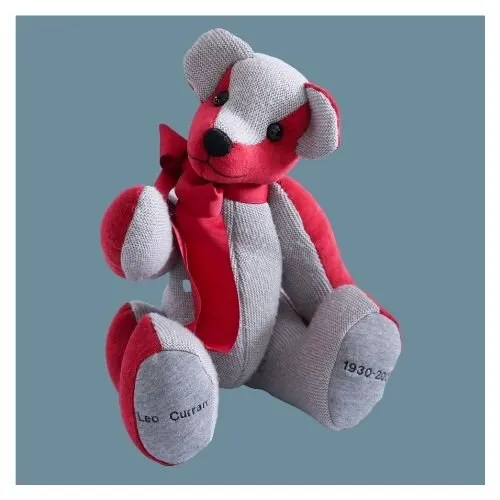 Memory Bear sitting with stitched pads in red and grey colours