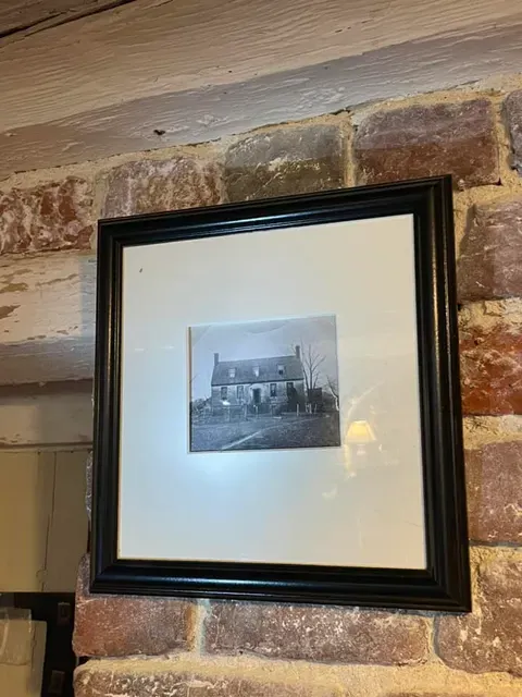Early 20th century photo of the manor house at Smith's Fort, displaying in the Museum Store