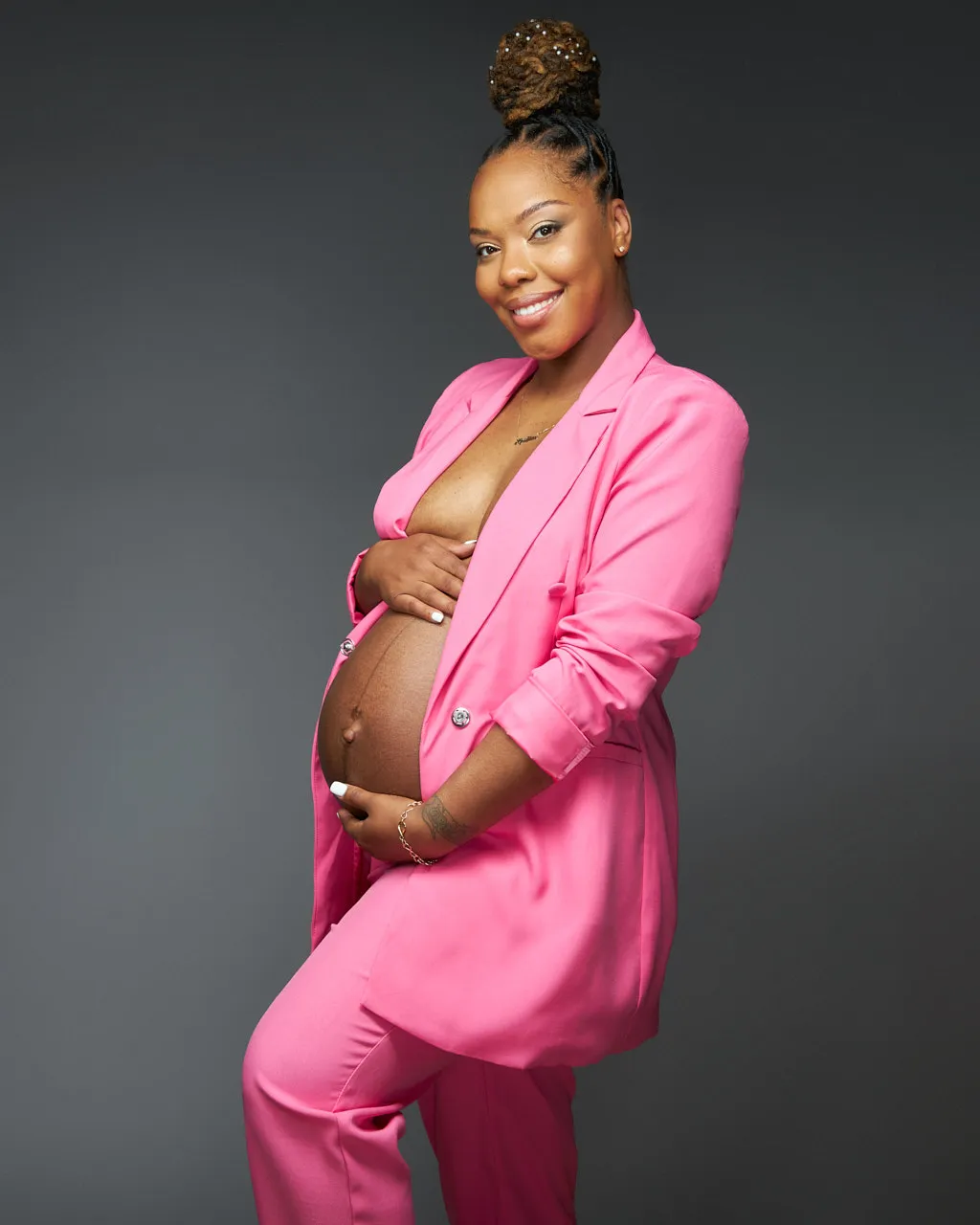 Maternity photoshoot | pregnant woman of color in pink suit | Maternity portrait | Washington DC