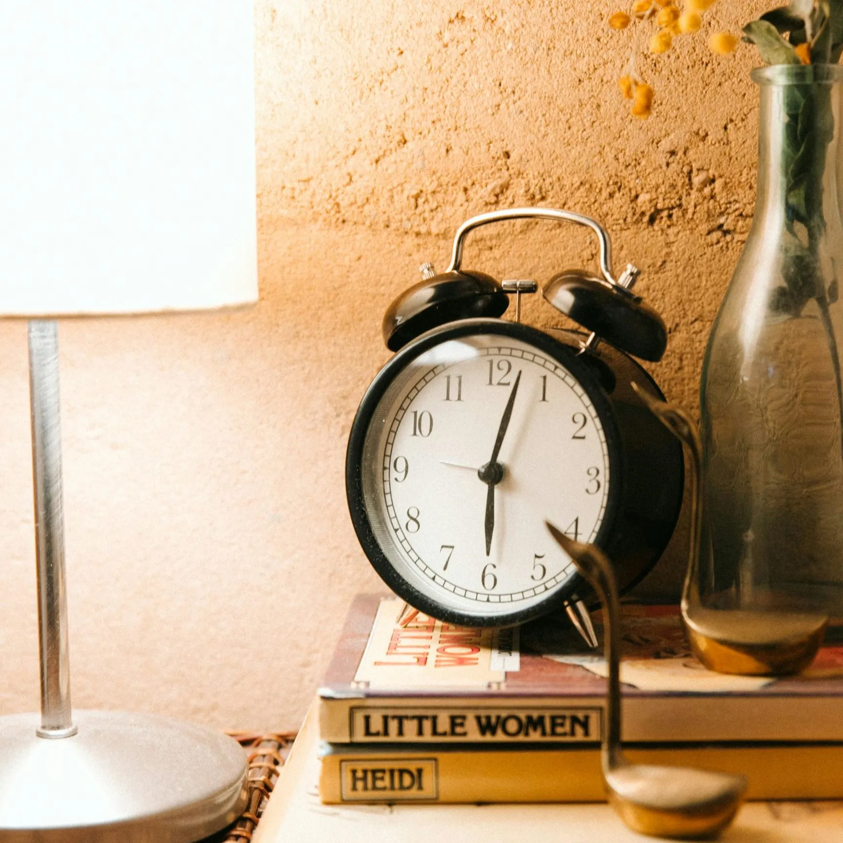 Vintage clock decor on books