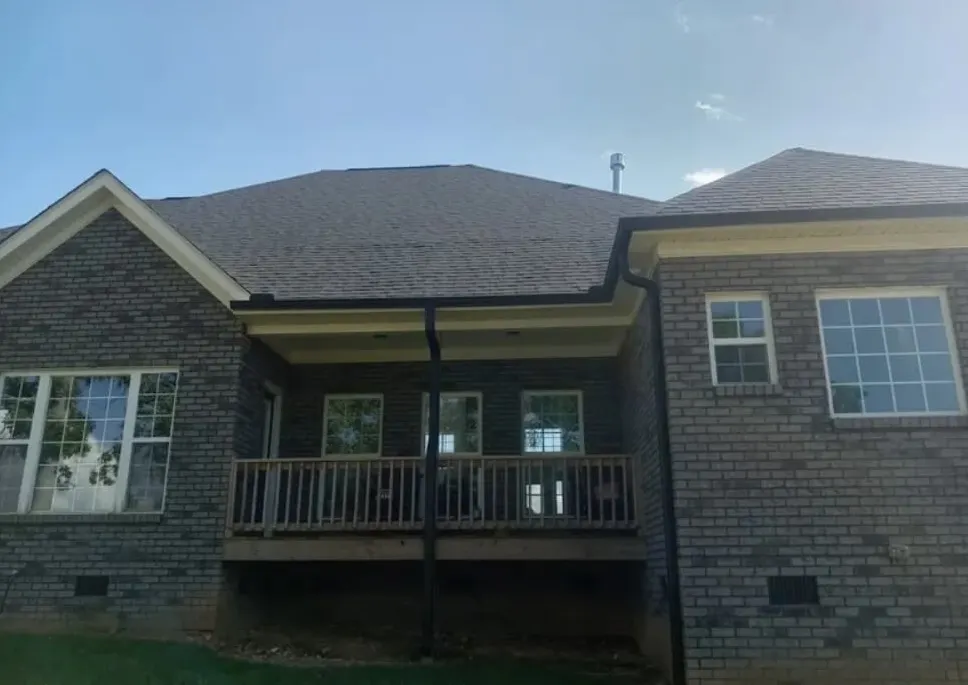 Newly installed custom residential seamless gutters on a home in Albemarle, NC