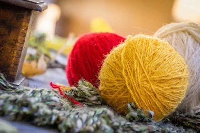 red yellow yarn wool balls knitting