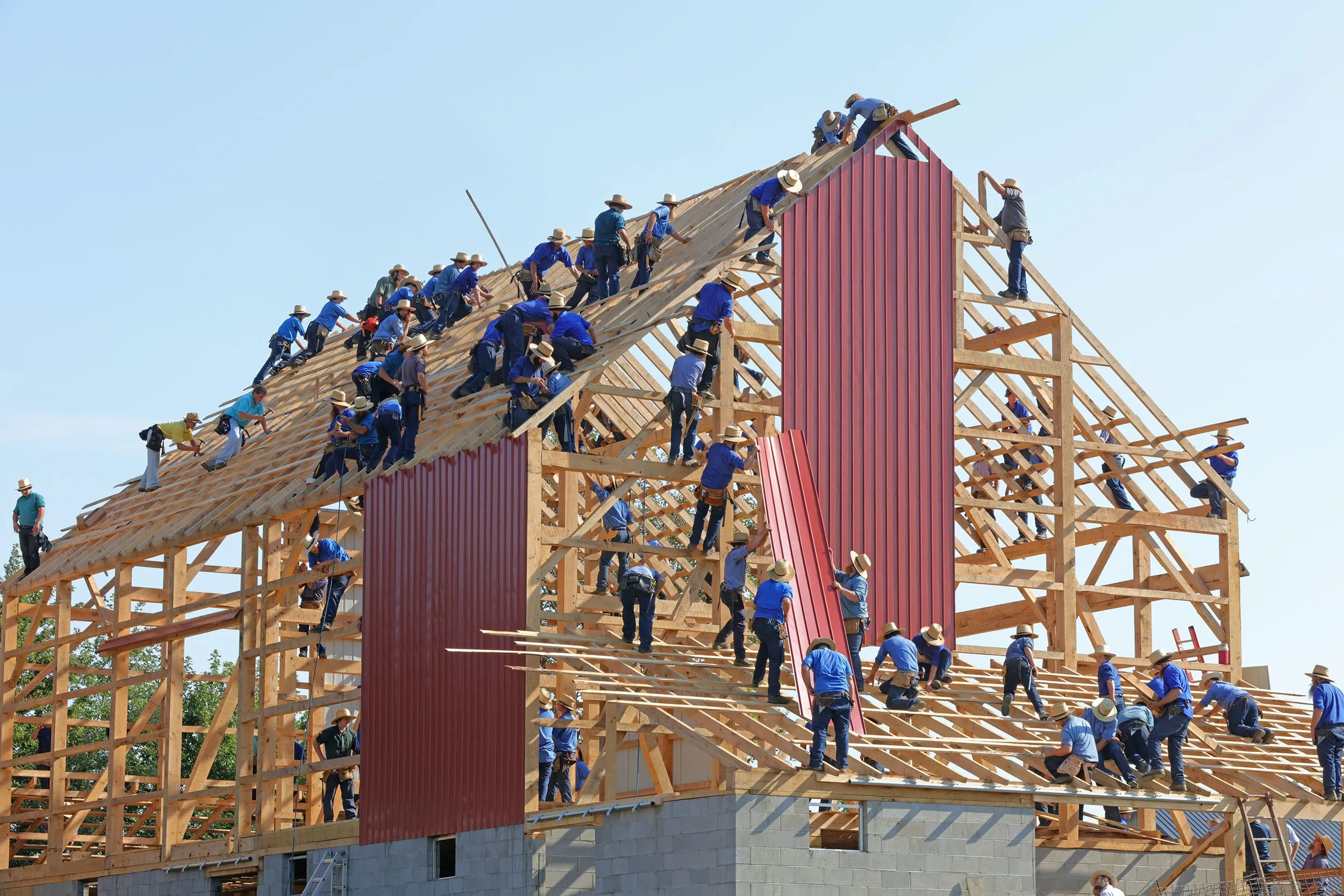 Picture of people building a house to represent building a workplace culture