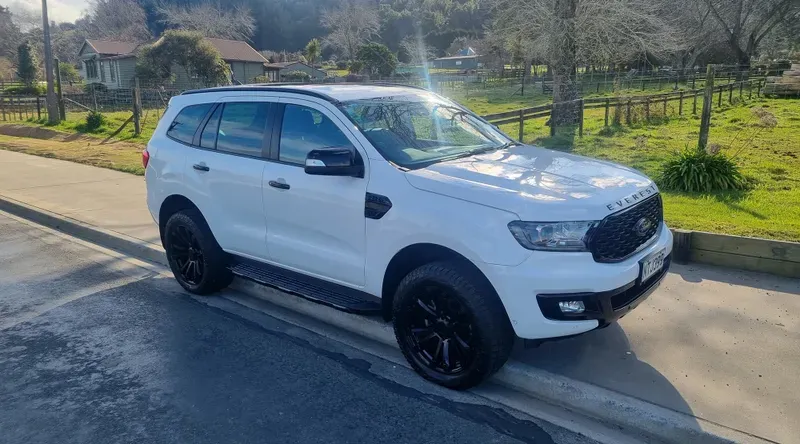 White Ford Everest SUV parked on a residential street after receiving premium detailing services from HGD Detailing in Rotorua, Bay of Plenty.