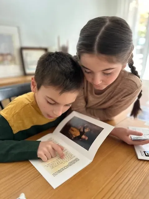 10-year-old twins reading the words of George Washington from History Unboxed