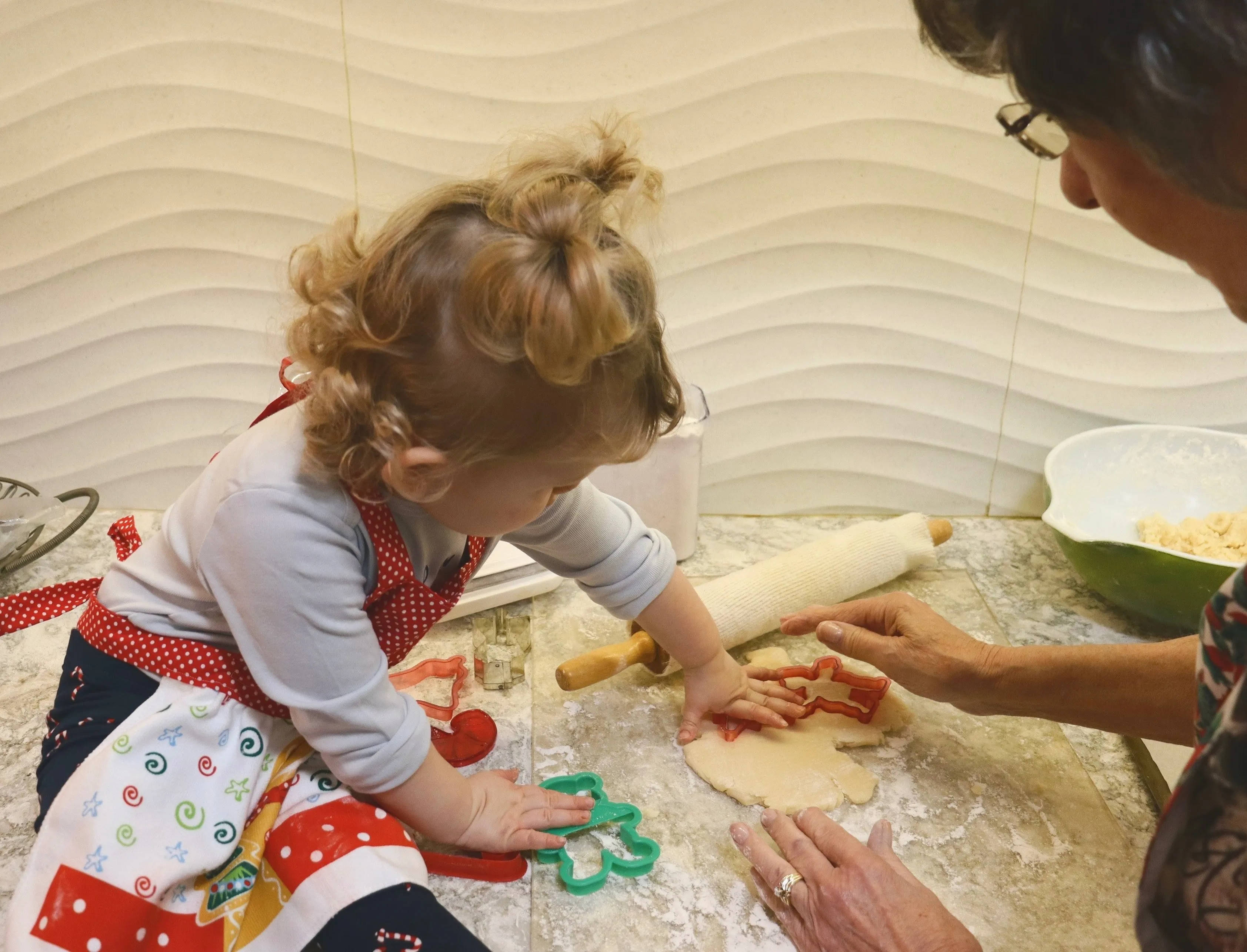 girl baking with grandma