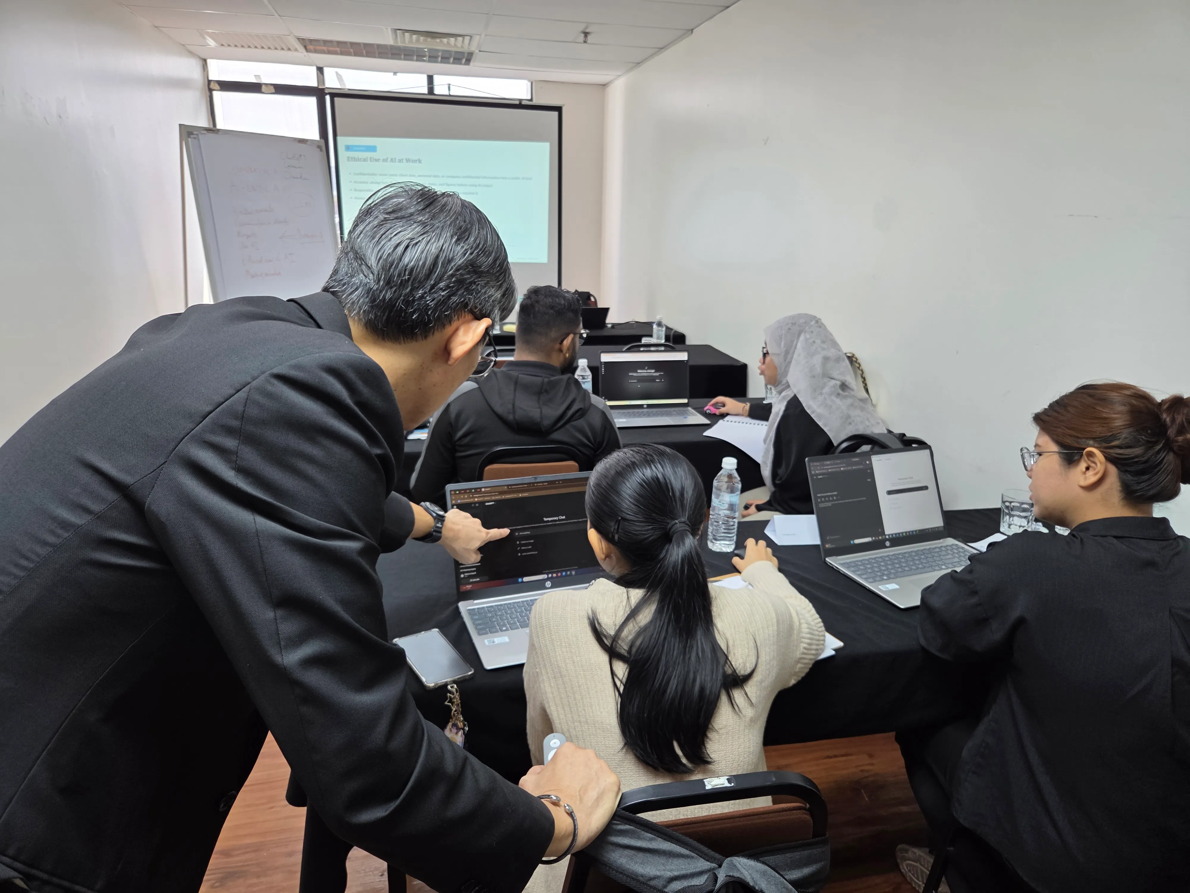 2NRich Asia AI-Powered Solutions training session in Malaysia — participants engaged in experiential learning and team activities