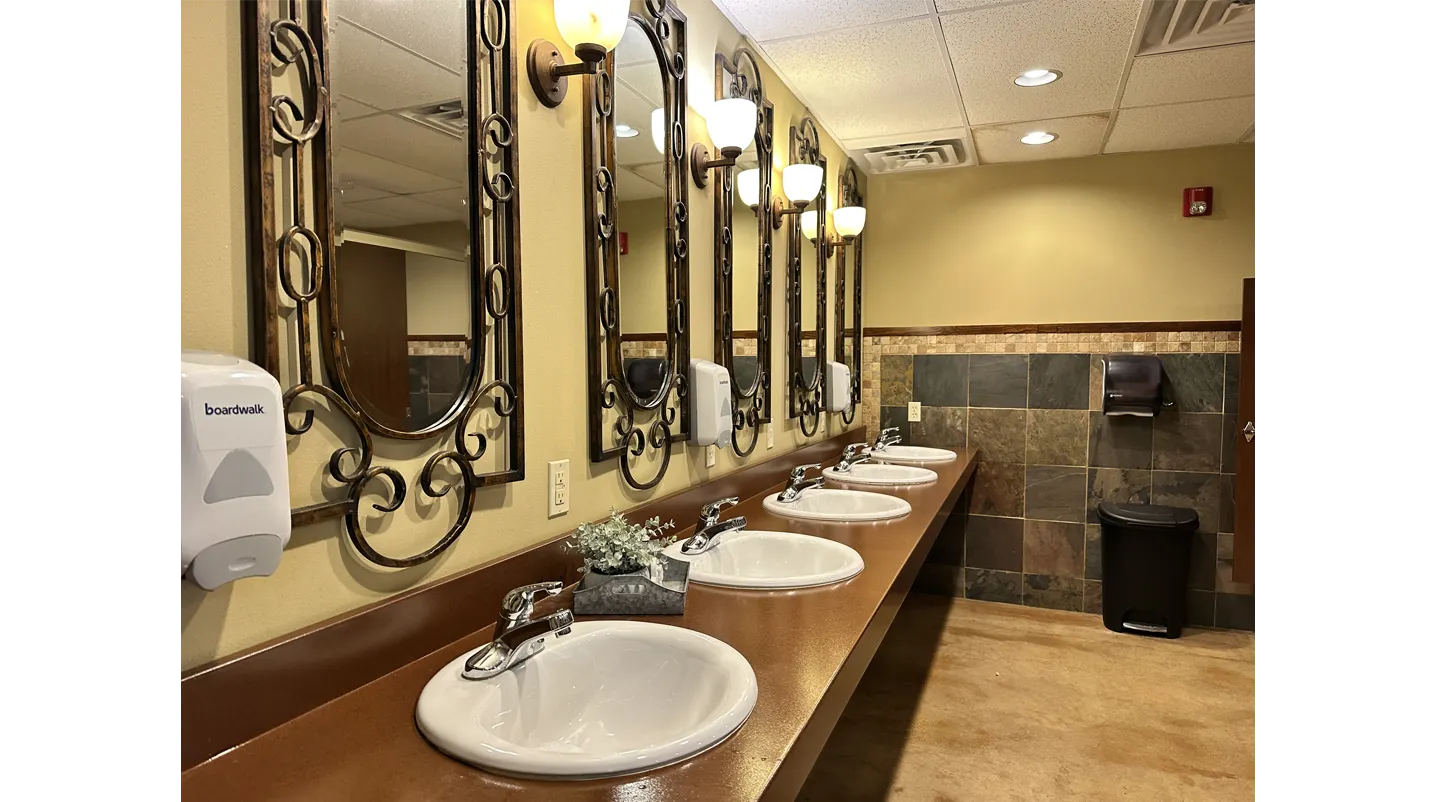 metal countertops in a commercial bathroom