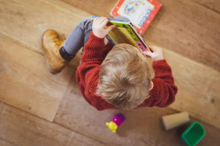 Kid with LearningTime Book